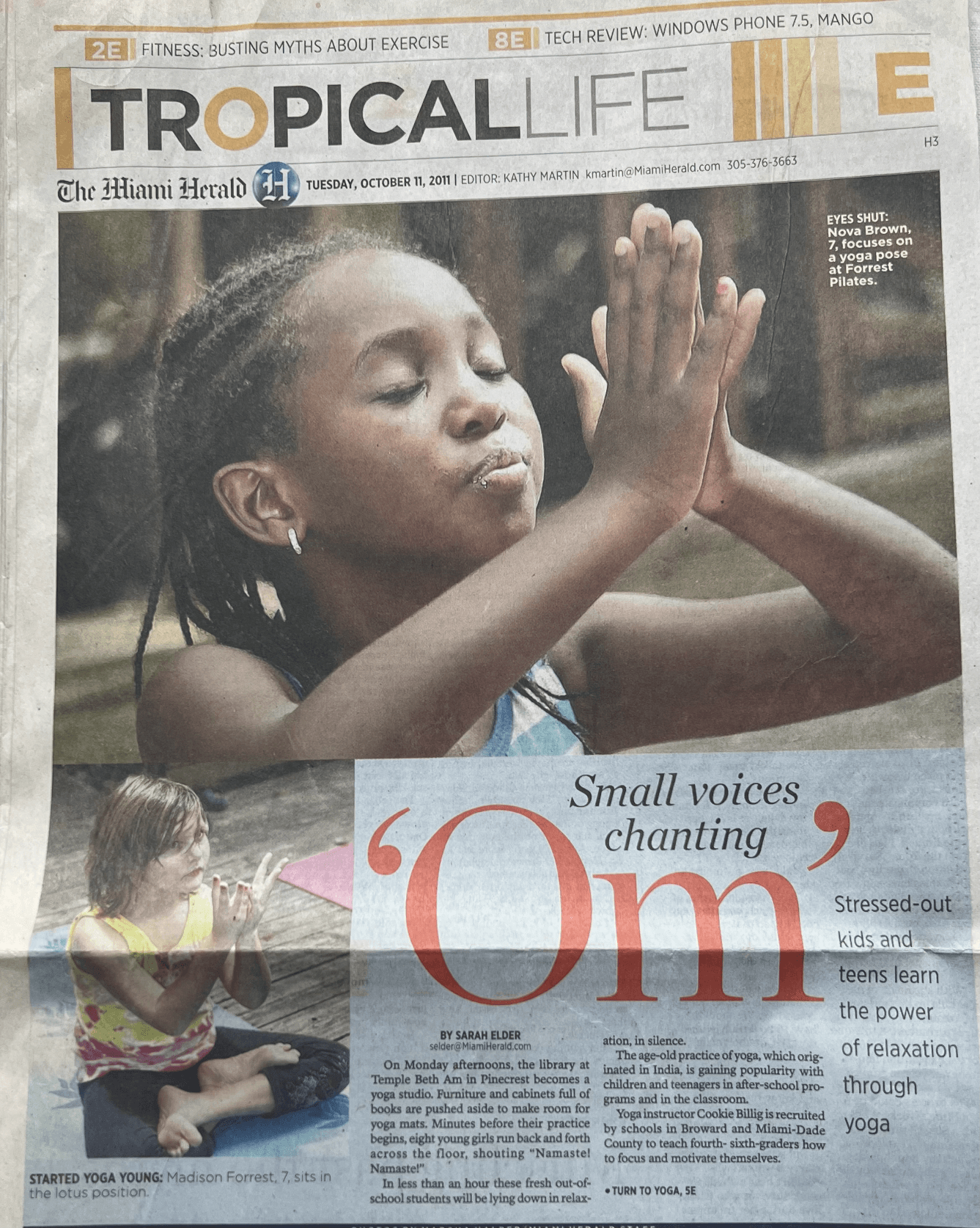 a newspaper article about small voices cherishing om