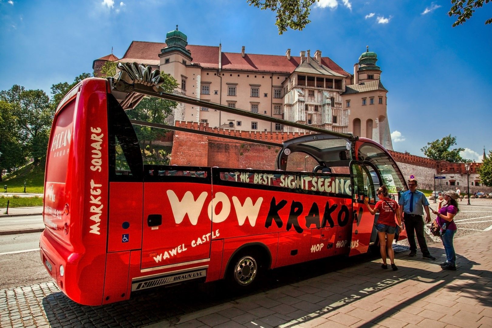 Red double-decker hop-on hop-off bus in Kraków