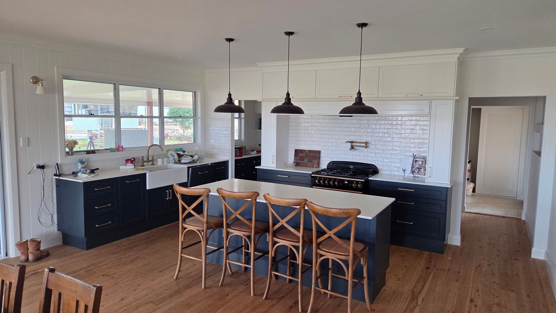 A Modern Living Room With Hardwood Floors — Crowfoot Constructions in Dubbo, NSW