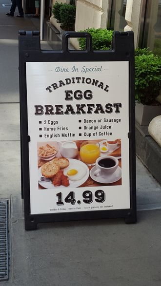 A sign that says traditional egg breakfast for 14.99
