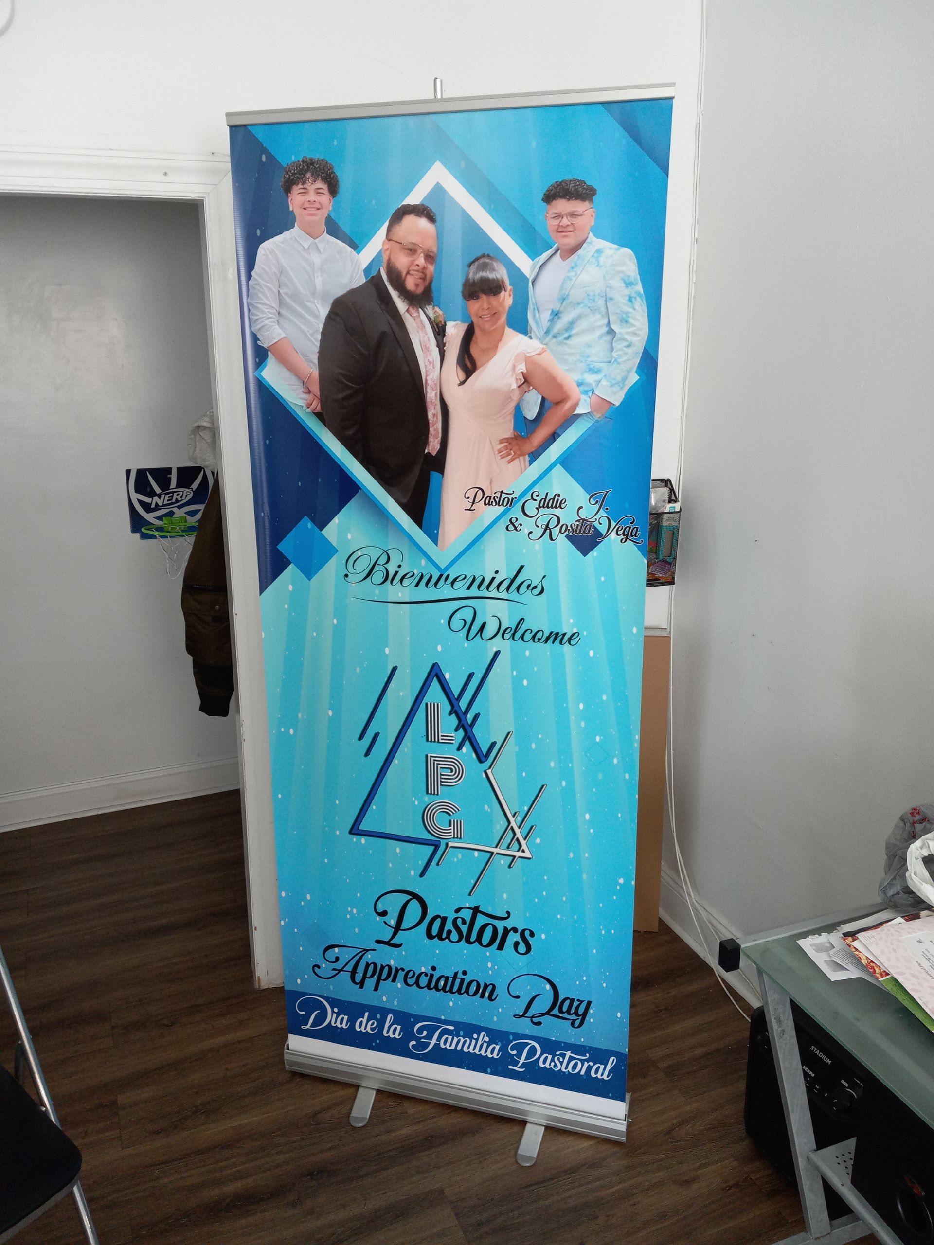 A blue banner with a picture of a man and woman on it
