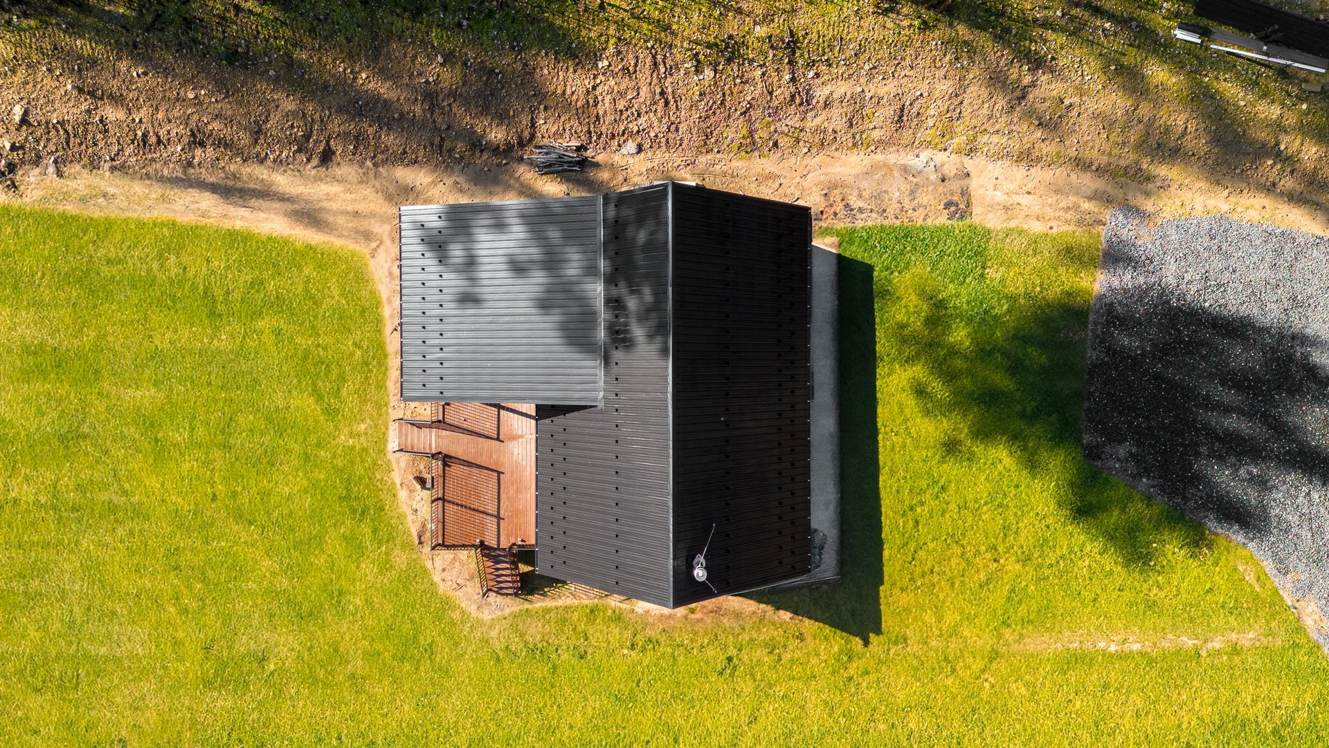 modern cabin design and construction with metal siding in Port Matilda