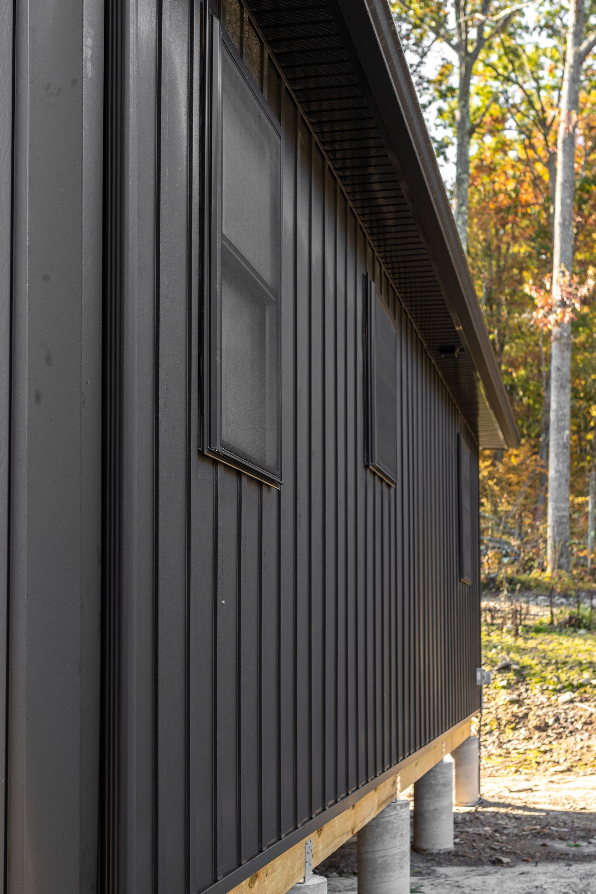 modern cabin design and construction with metal siding in State College 