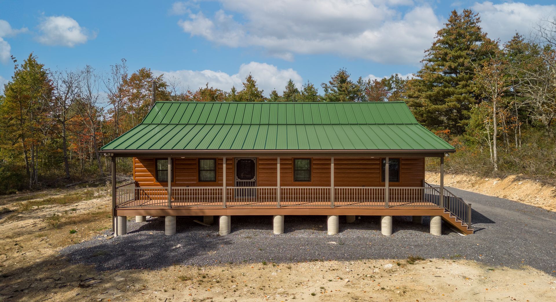 Custom cabin with faux wood siding 