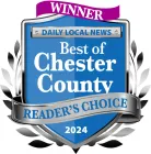 Winner badge: Daily Local News Best of Chester County Readers' Choice 2024, blue and silver with laurel wreaths