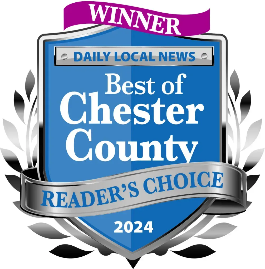 Winner badge: Daily Local News Best of Chester County Readers' Choice 2024, blue and silver with laurel wreaths