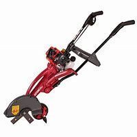 a red and black lawn mower on a white background .