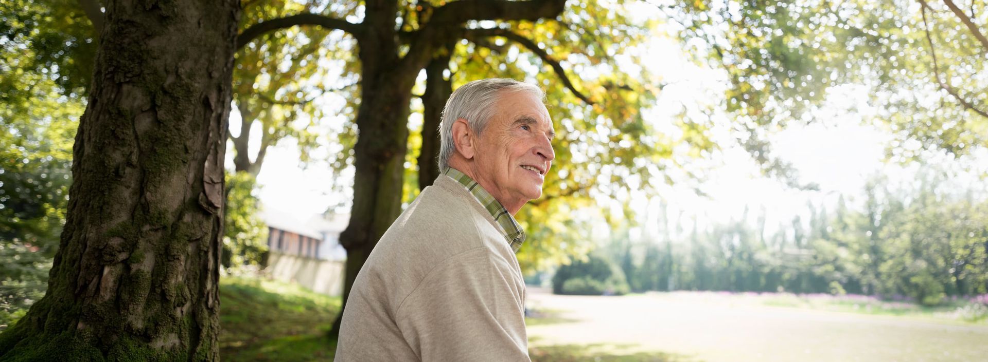 Senior man enjoying the grounds at Riverside Commons in Dearborn