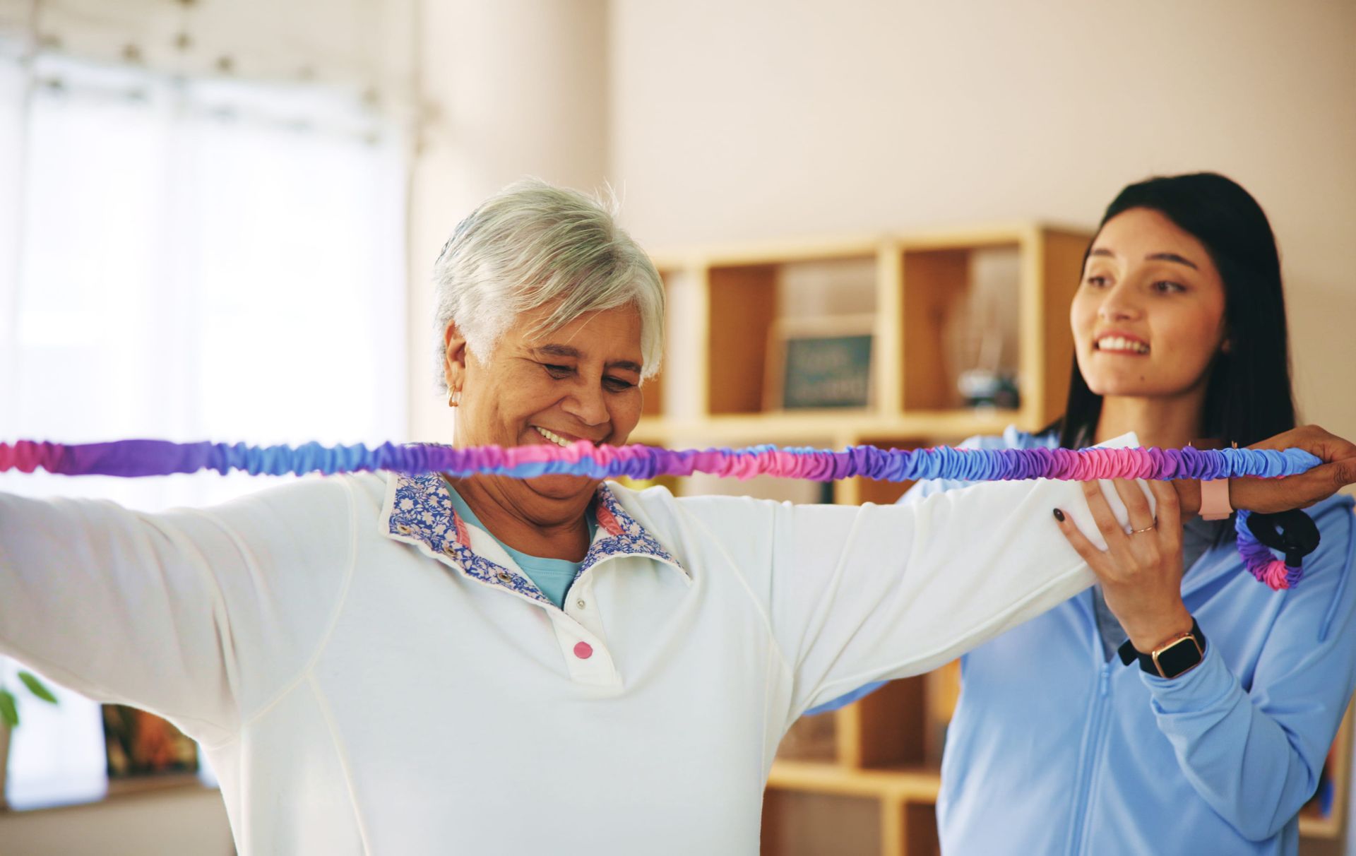 Senior woman doing physical therapy with a therapist at Riverside Commons Rehab