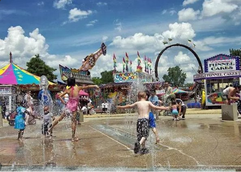 Children playing at a community event sponsored by Evans
