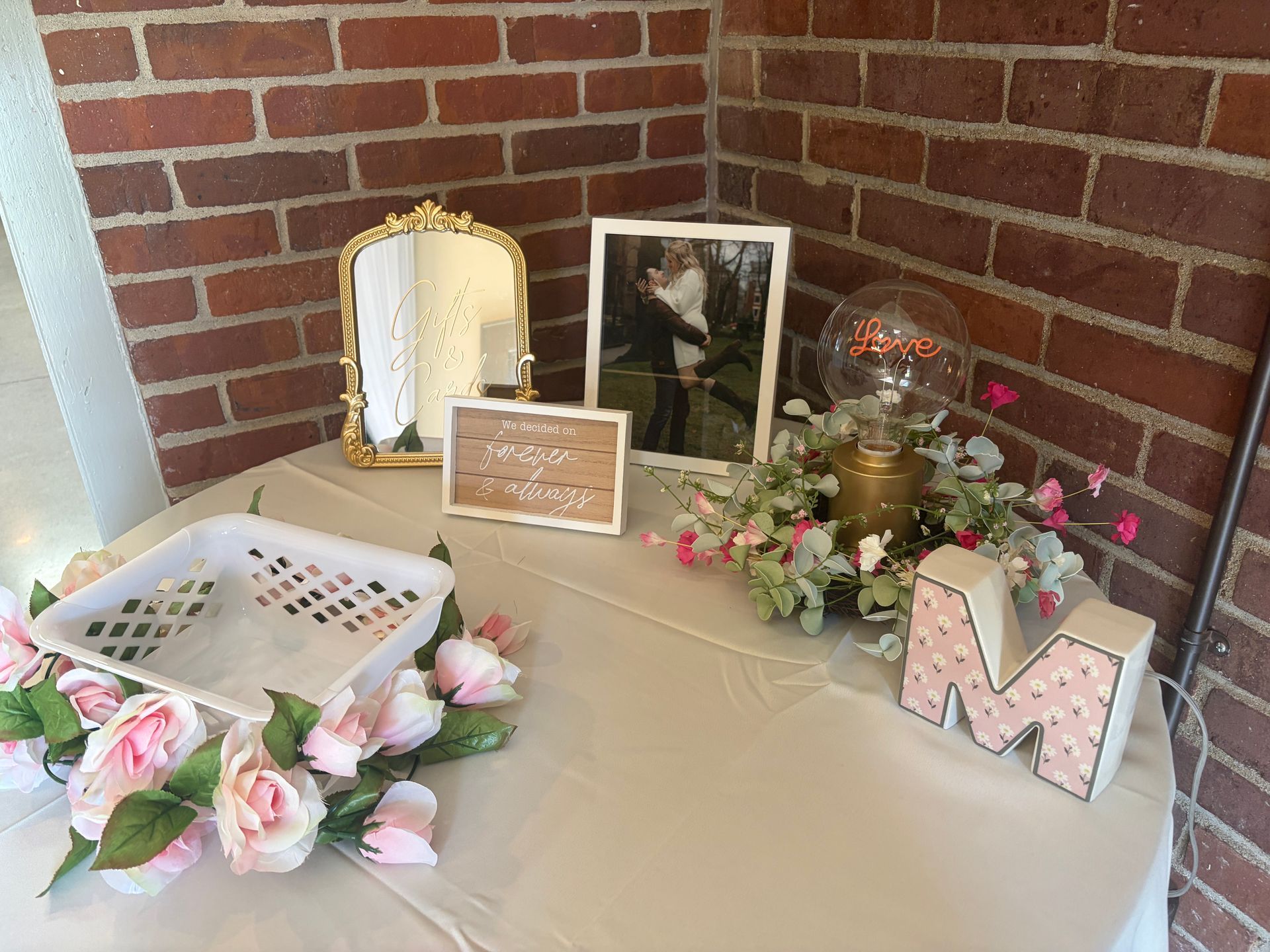 Gift and card table with a gold mirrored sign