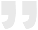 Two pale gray quotation marks on a white background