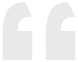 Two pale gray quotation marks on a white background