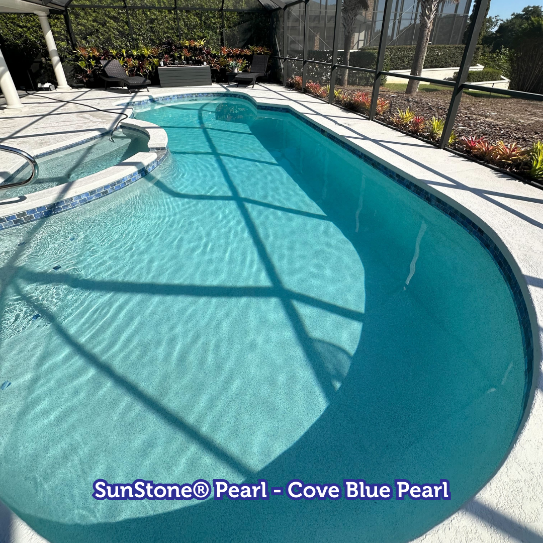 Swimming pool with light blue water and a gray deck; the pool is labeled 