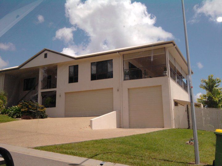 A Large White House With Two Garages And A Balcony — Aaron Lee Painting Pty Ltd In Jensen, QLD
