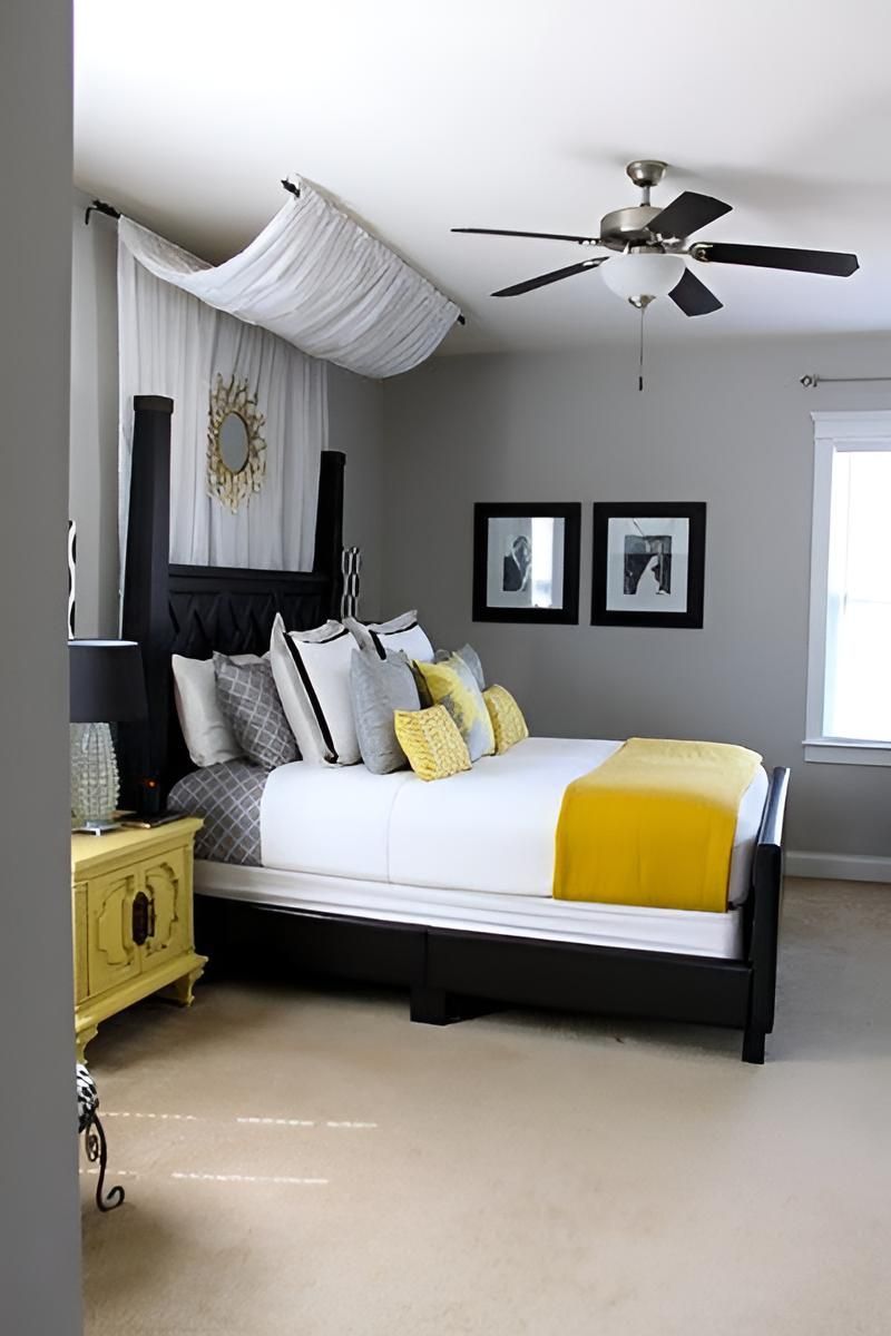 A Bedroom With A Bed And A Ceiling Fan — Aaron Lee Painting Pty Ltd In Jensen, QLD