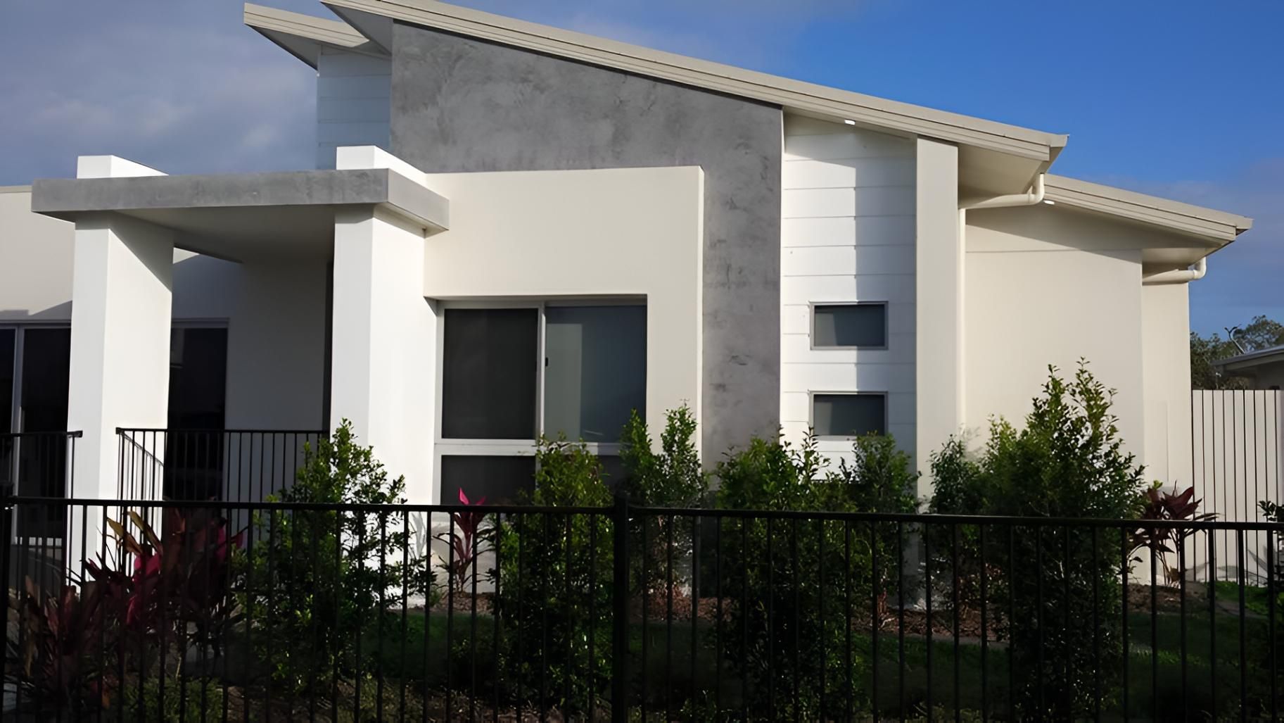 Home With Light Blue Painted Exterior — Aaron Lee Painting Pty Ltd In Jensen, QLD