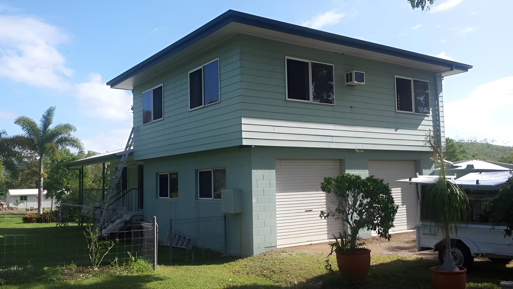 Home With Light Blue Painted Exterior — Aaron Lee Painting Pty Ltd In Jensen, QLD