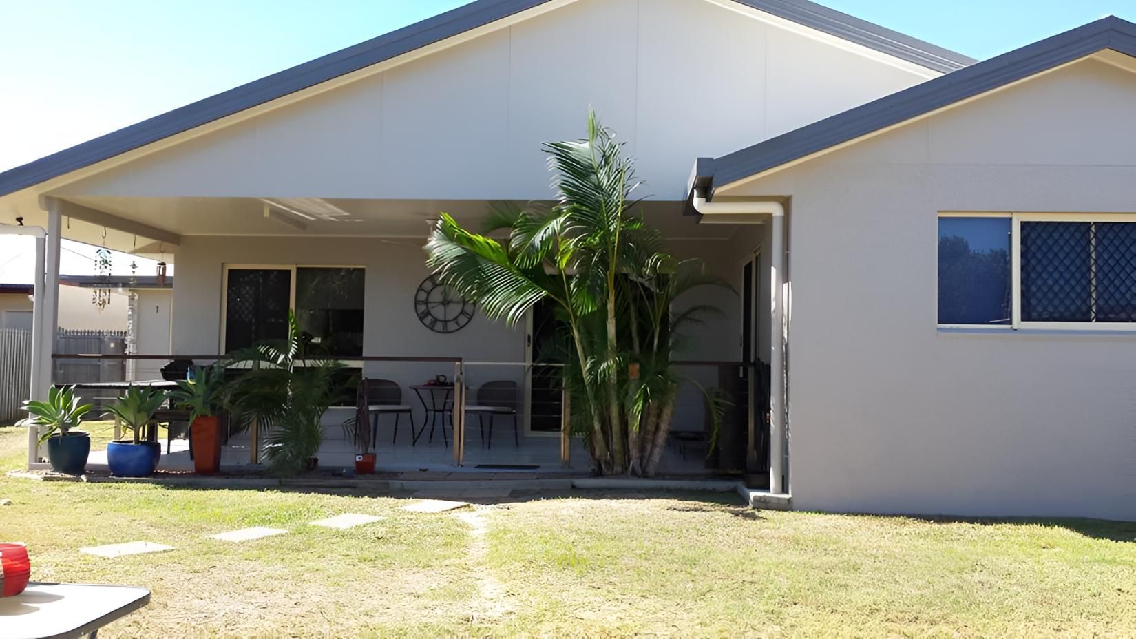 A House With A Porch And A Clock On The Wall — Aaron Lee Painting Pty Ltd In Douglas, QLD