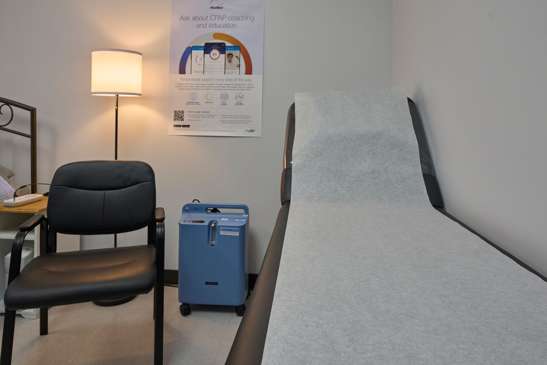 A doctor 's office with a poster on the wall