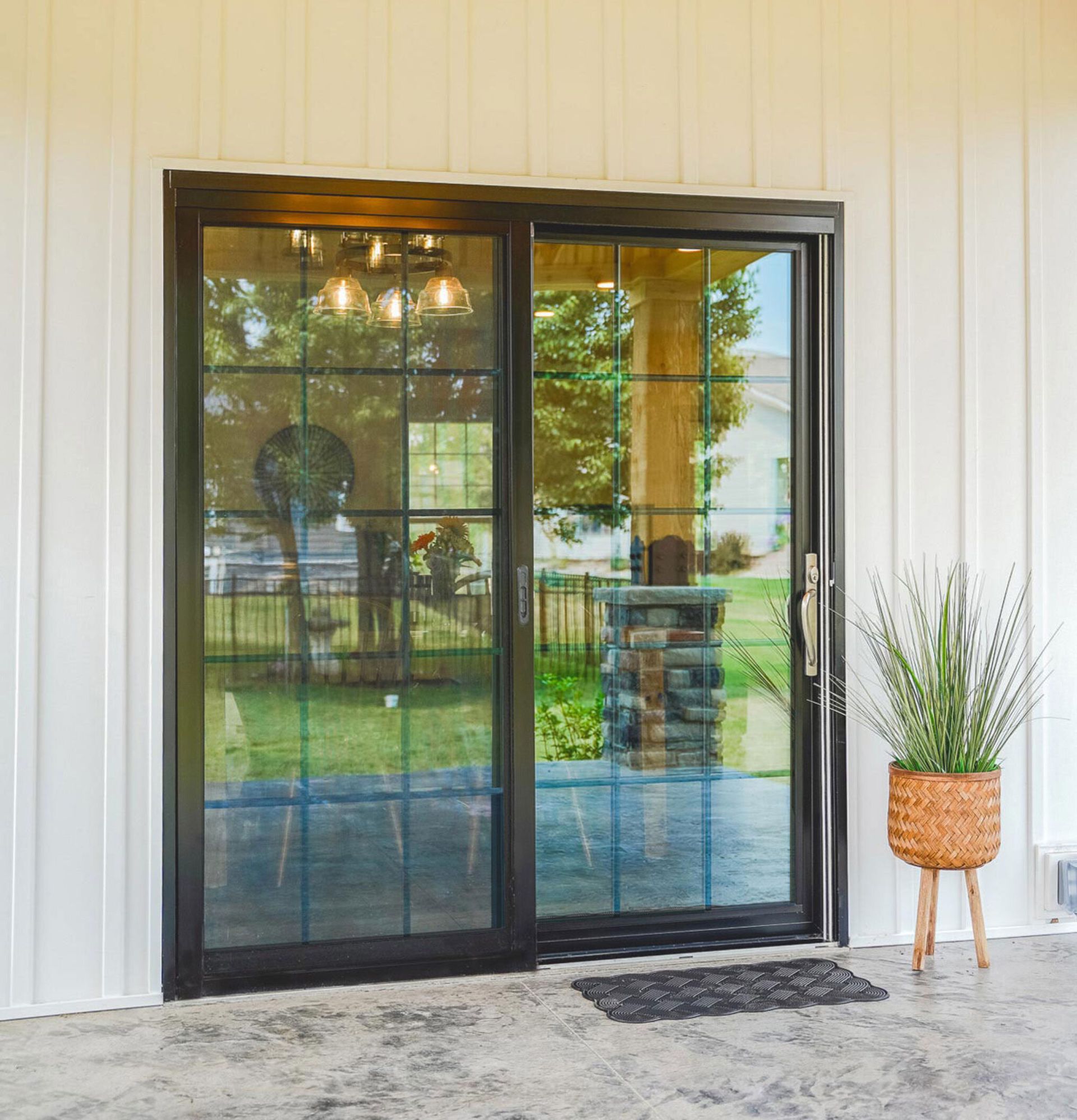Black-framed Endure sliding patio door with colonial grid - Glass Daddy Redmond