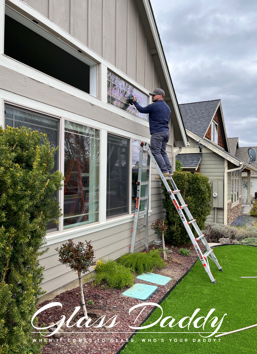 Glass Daddy technician replacing residential window glass in Redmond OR