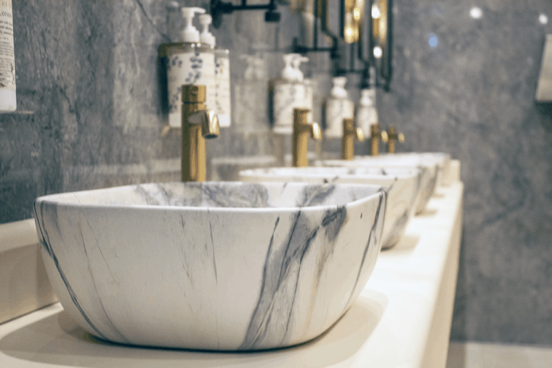 Marble washbasins in the River Inn