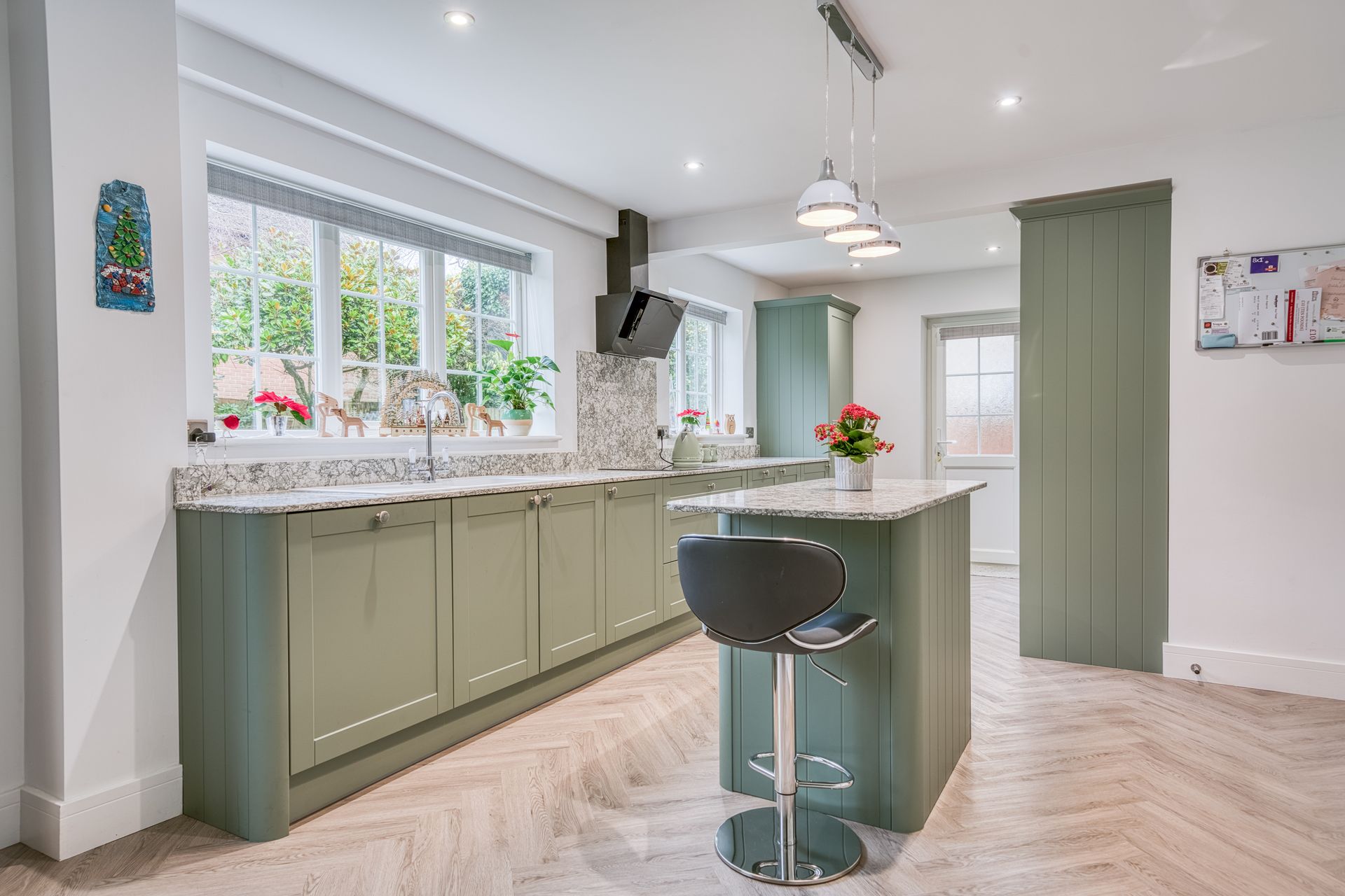 kitchen with olive cabinets and modern layout