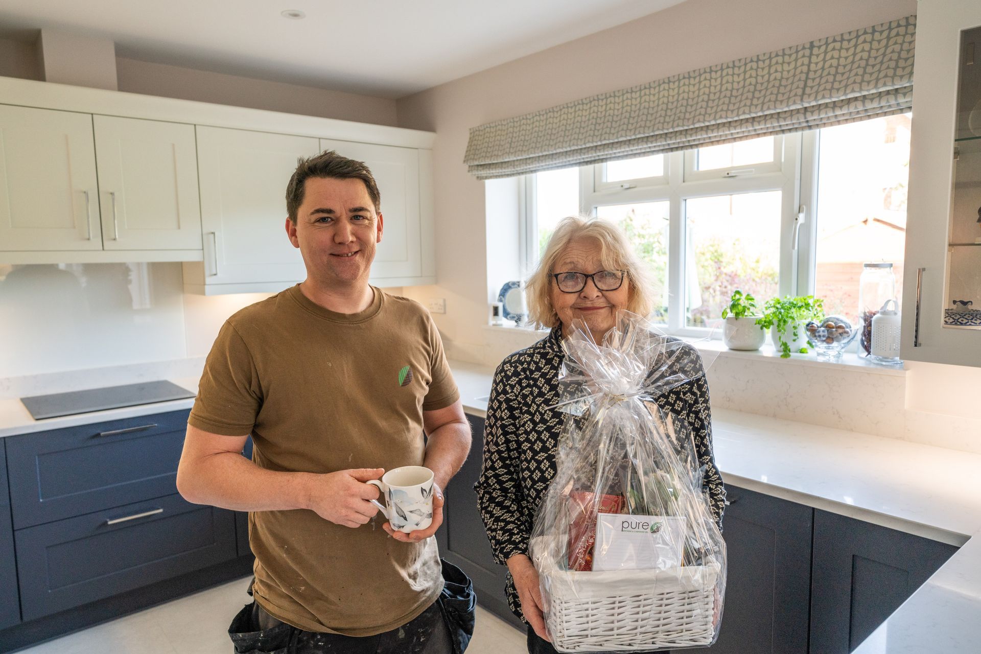 Knowland Drive, Completed kitchen. Mike with handover gift