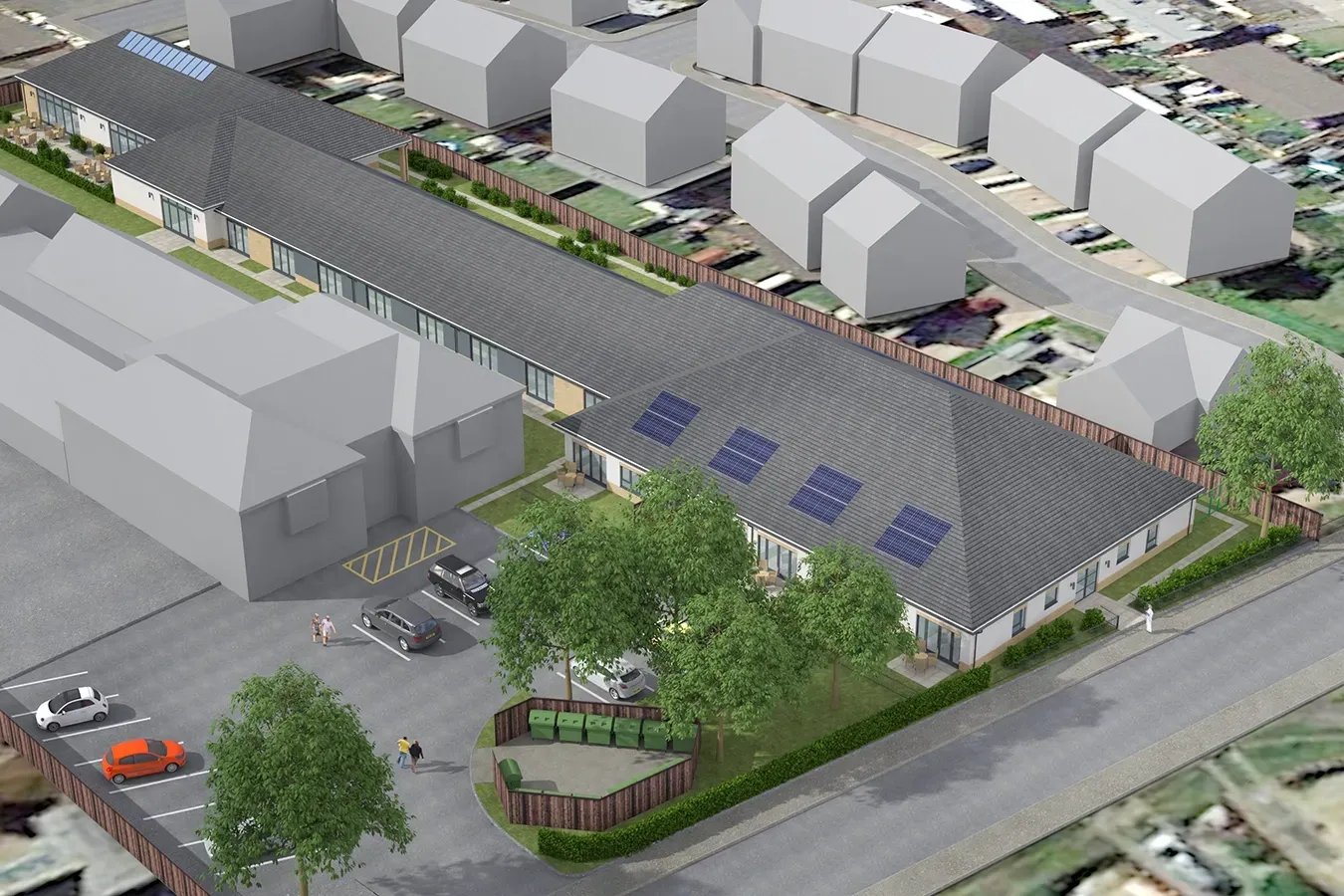 An aerial view of a building with solar panels on the roof