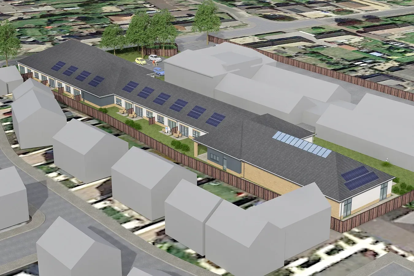 An aerial view of a building with solar panels on the roof