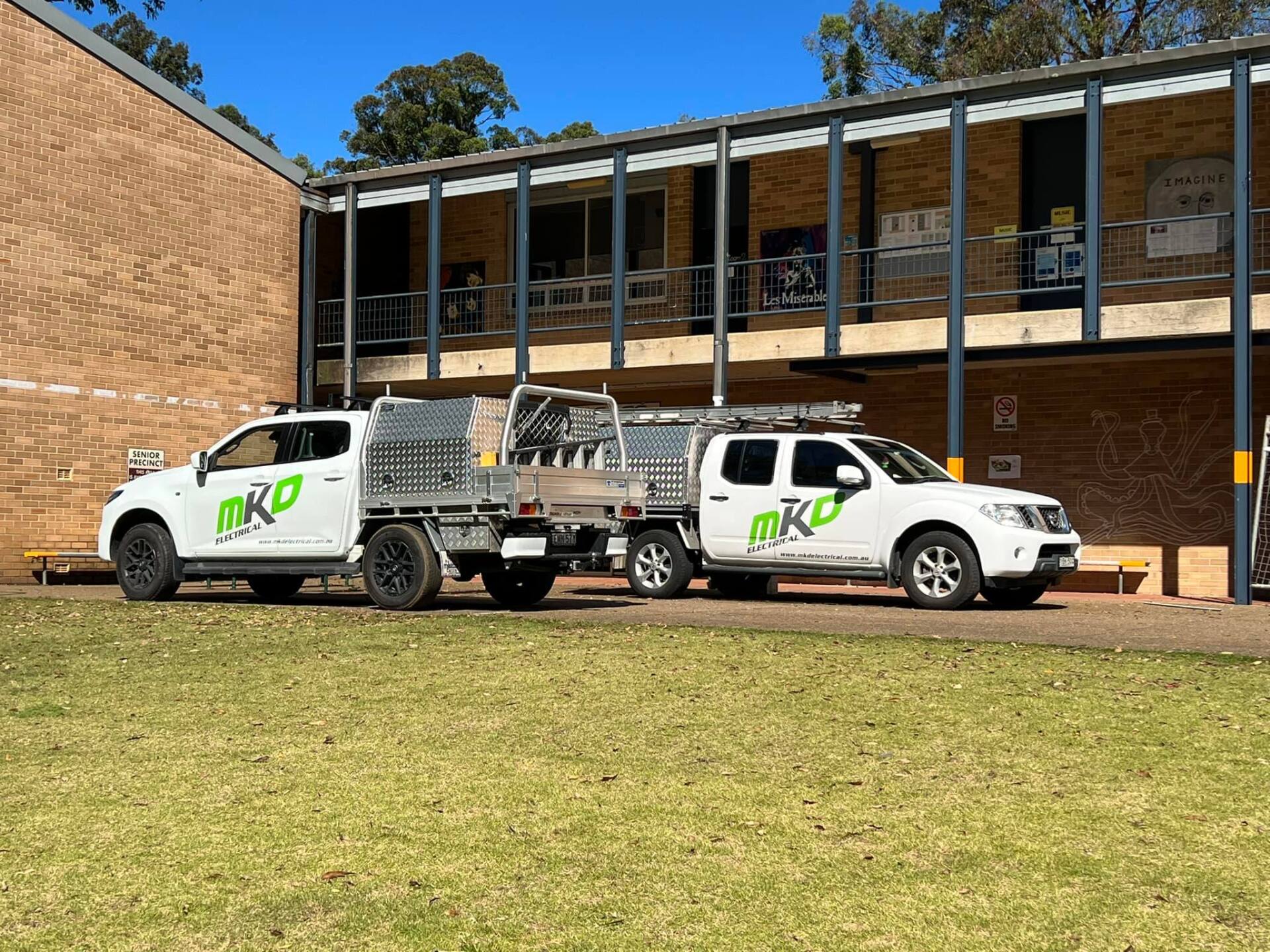 Electrical Service Team on Site — Penrith, NSW — MKD Electrical Vehicles used for LED lighting replacement services in Emu Plains