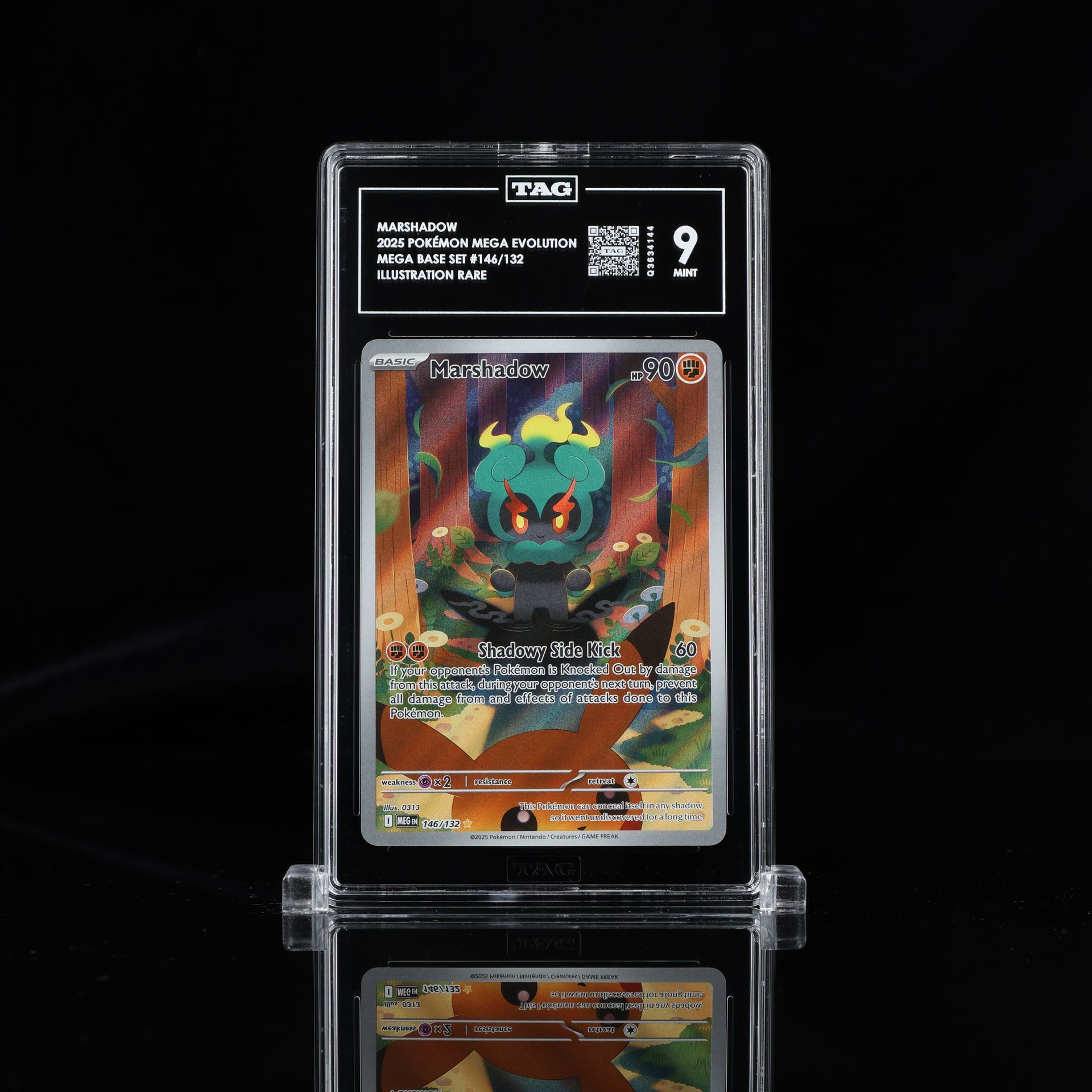 A graded Pokémon card in a black case, with a grade of 9.