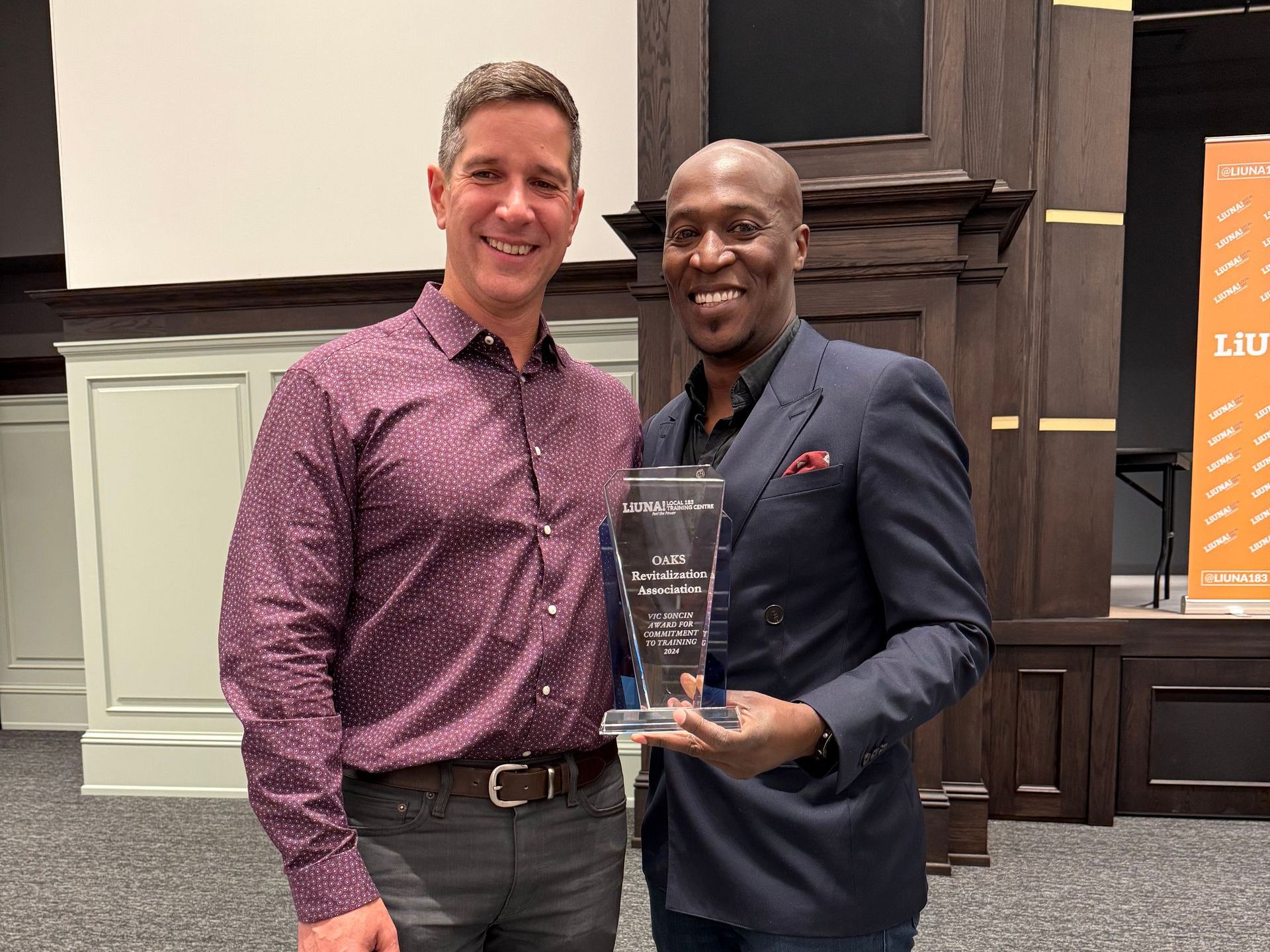 Mark and Joe standing next to each other holding the Vic Soncin Employer Appreciation Award. Mark and Joe standing next to each other holding the Vic Soncin Employer Appreciation Award.