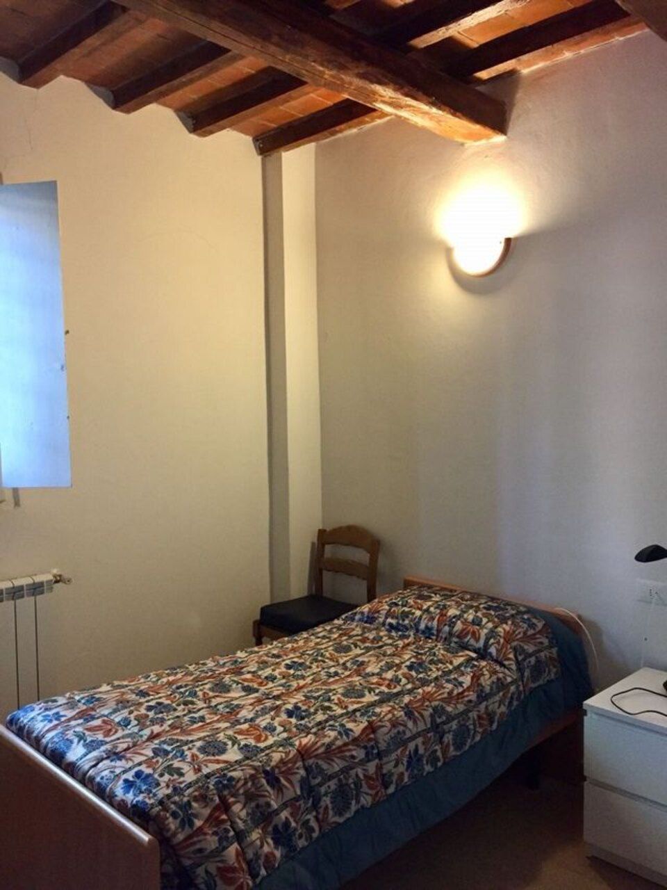 camera da letto dell'alloggio per anziani a Ferrara - Casa Famiglia Villa Pace 