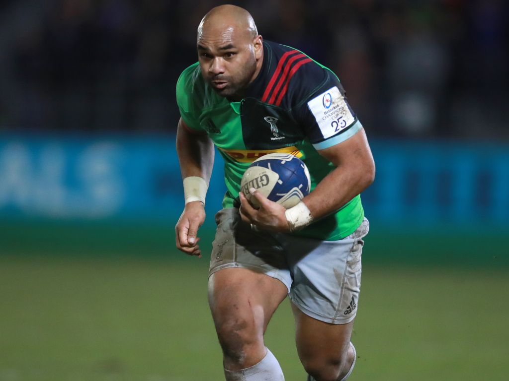 Big man runs with rugby ball