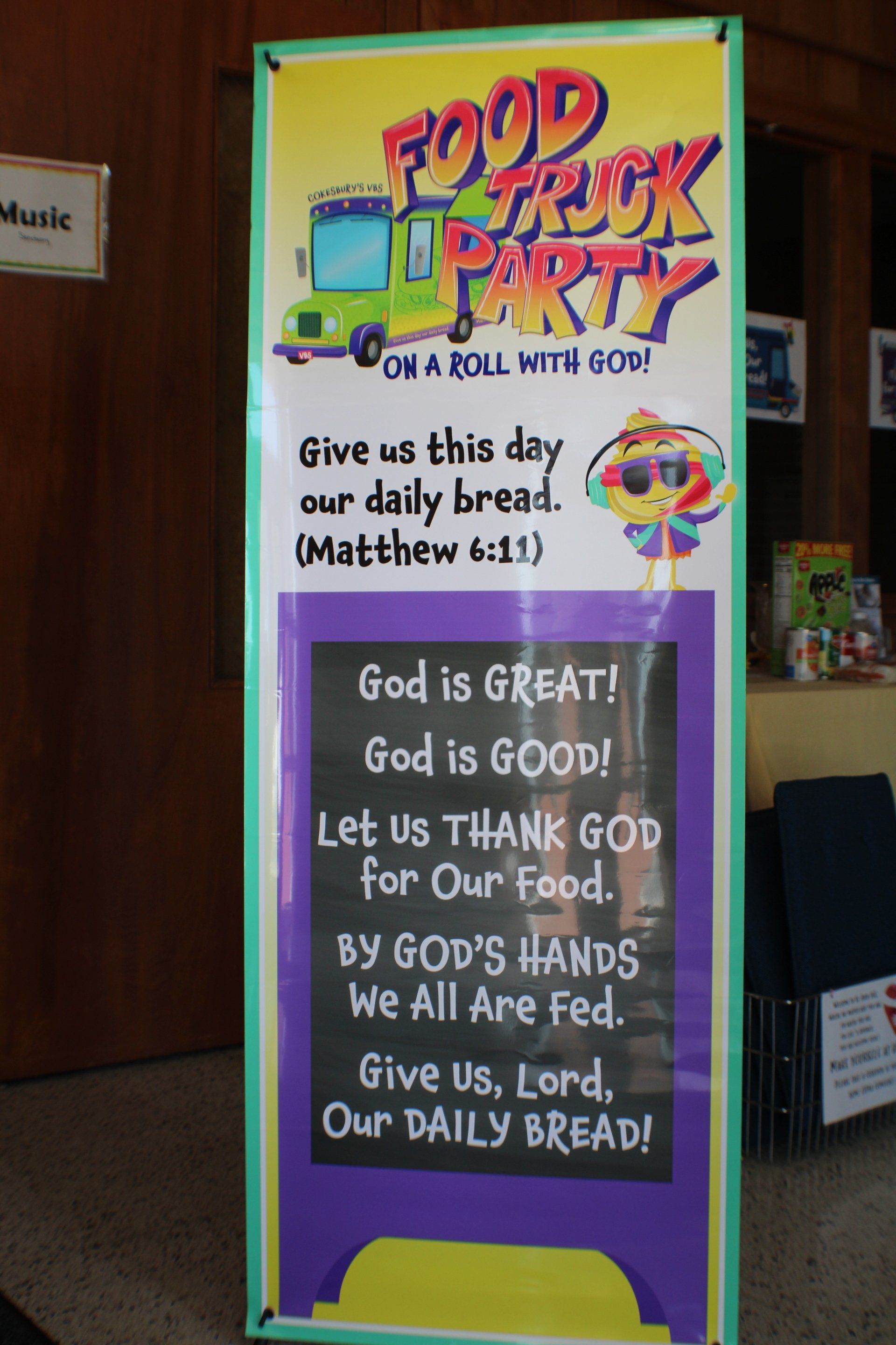 Colorful “Food Truck Party” church sign with a prayer for daily bread and Bible verse Matthew 6:11