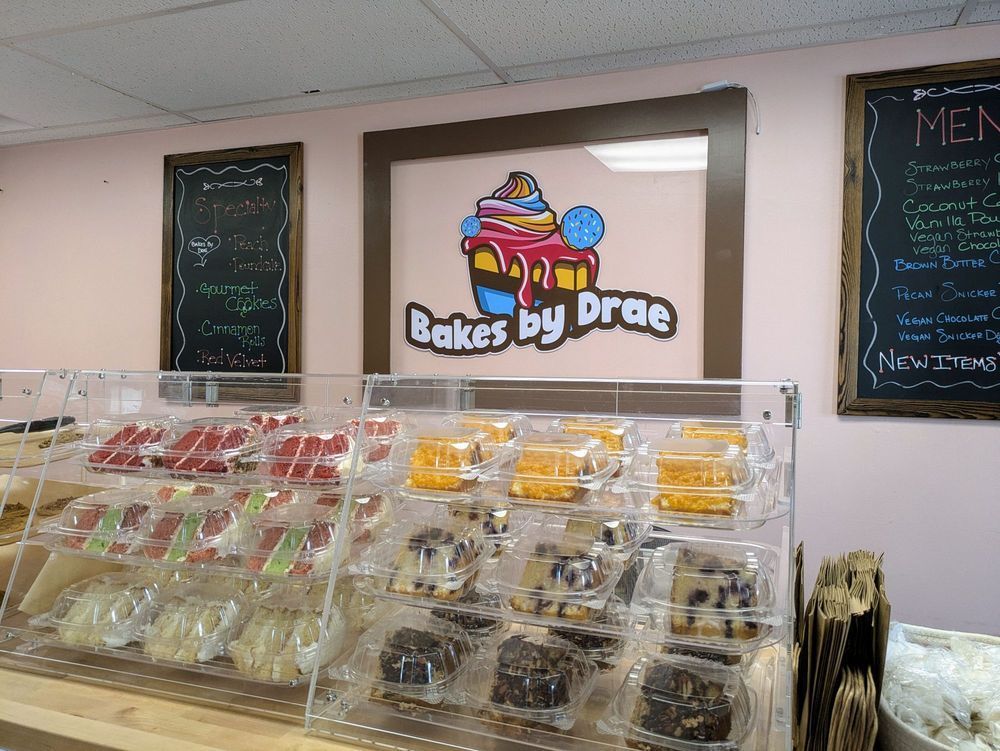 Bakery display case with packaged baked goods; 