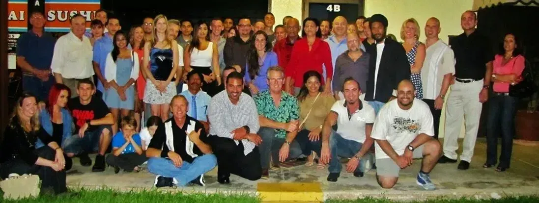 A large group of people are posing for a picture