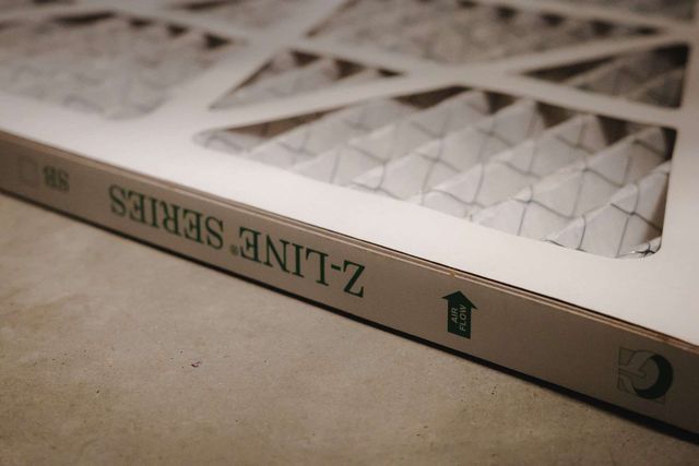 Close-up of a Z-Line Series air filter with an arrow indicating airflow direction.