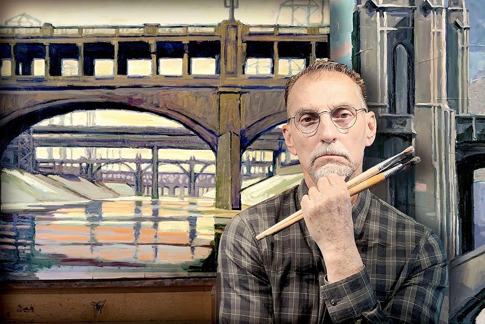 Artist John Kosta in front of one of his painting from