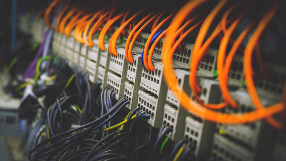 A Bunch of Wires Are Connected to Servers in a Server Room — Audiomation in Tuncurry, NSW