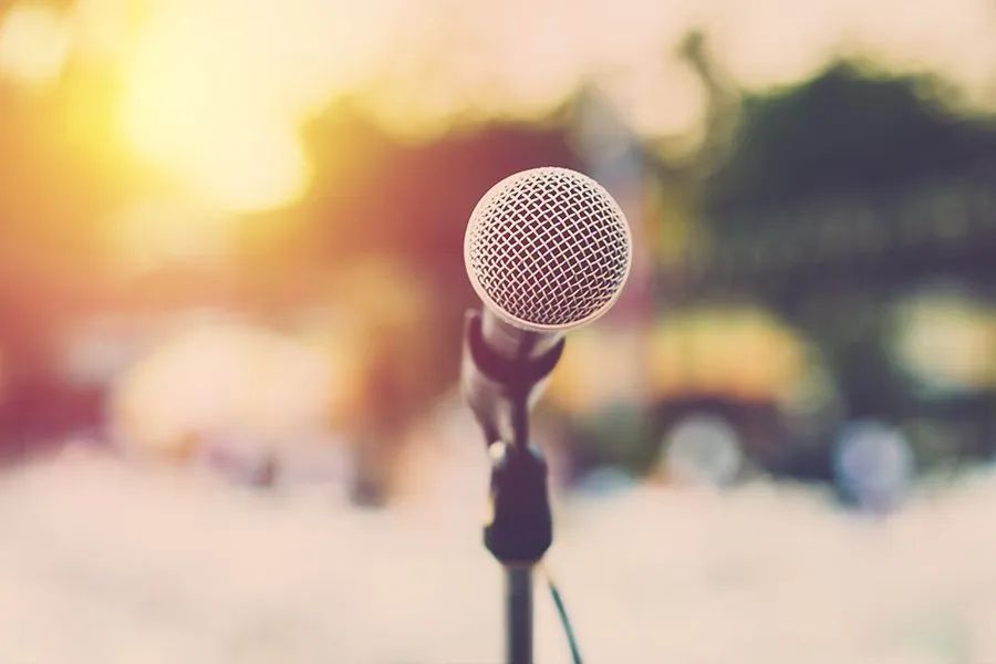 A Close Up of a Microphone on a Stand With a Blurry Background — Audiomation in Nabiac, NSW