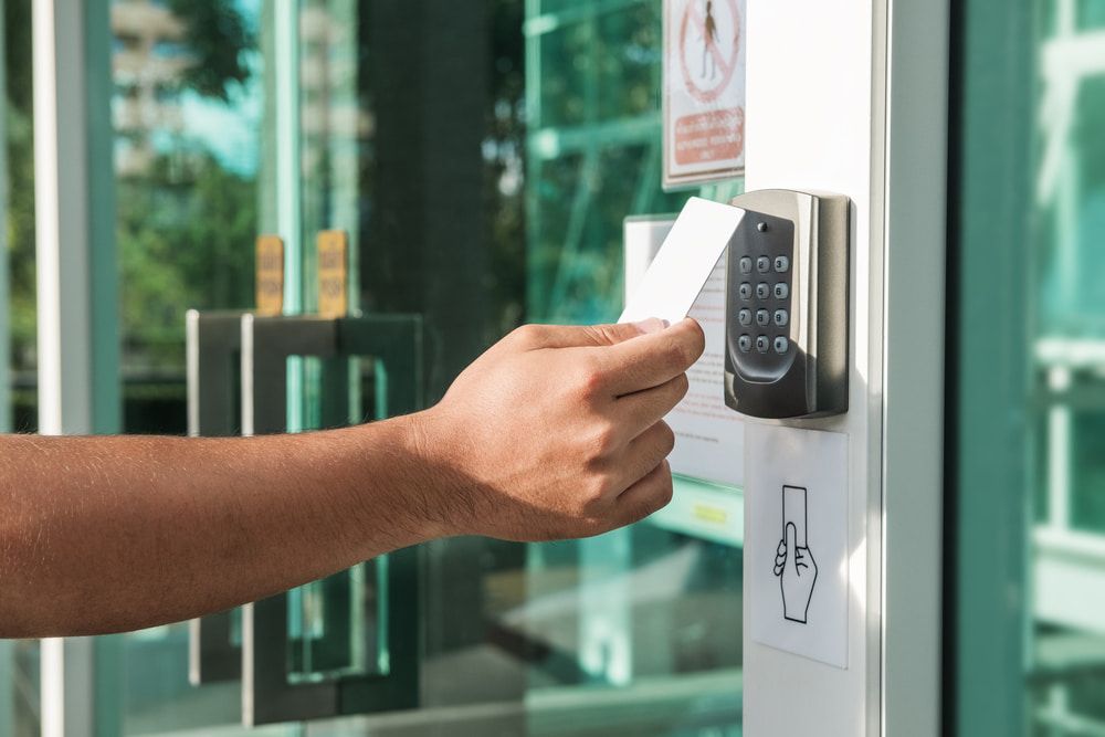 A Person is Using a Key Card to Open a Door — Audiomation in Tuncurry, NSW