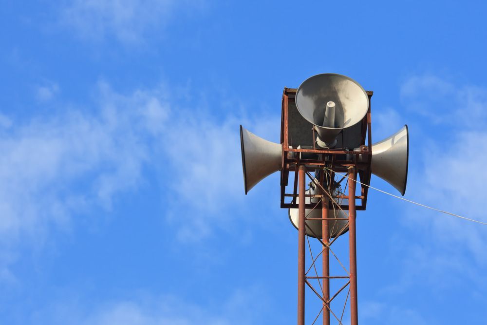 A Tower With a Lot of Speakers on It Against a Blue Sky — Audiomation in Wingham, NSW