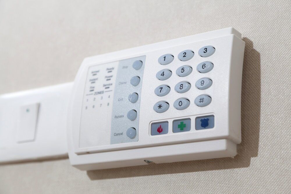 A White Security System is Mounted on a Wall — Audiomation in Old Bar, NSW