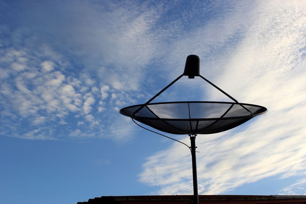 A Satellite Dish With a Blue Sky in the Background — Audiomation in Old Bar, NSW