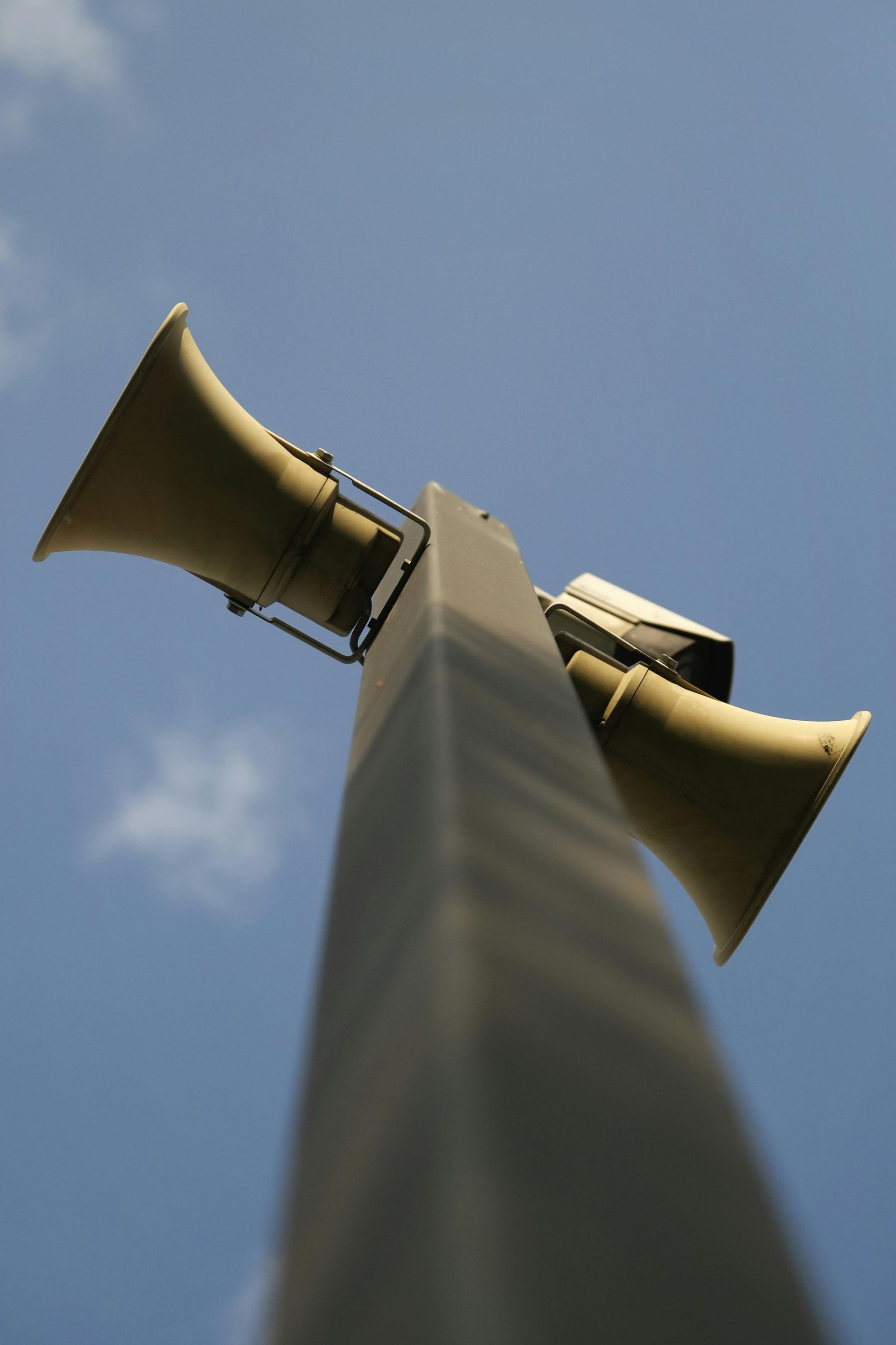 A Row of Speakers Against a Blue Sky With Clouds — Audiomation in Nabiac, NSW