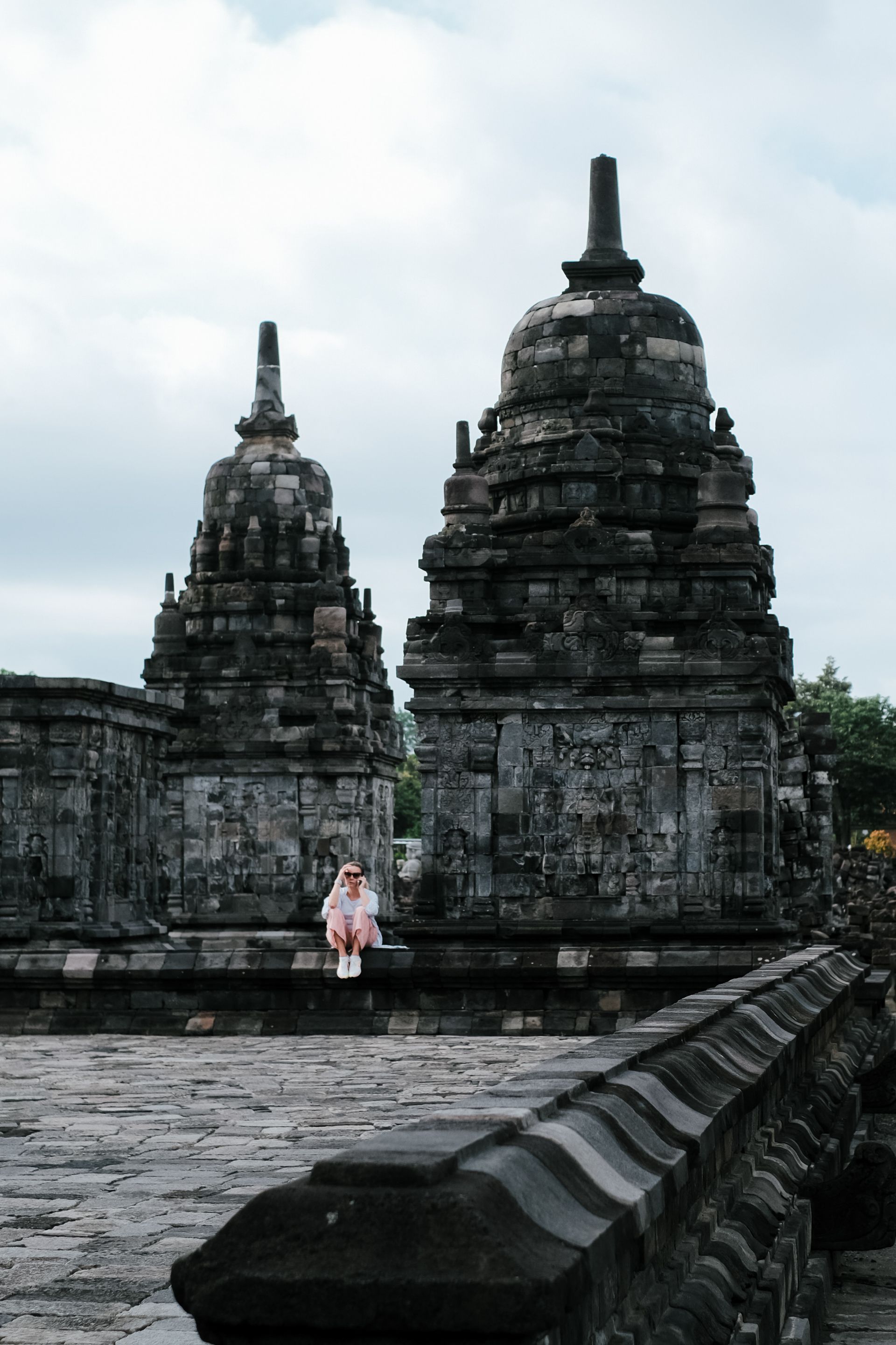girl take phone call during her visit at Borobudur Pramaban With YKexplore 