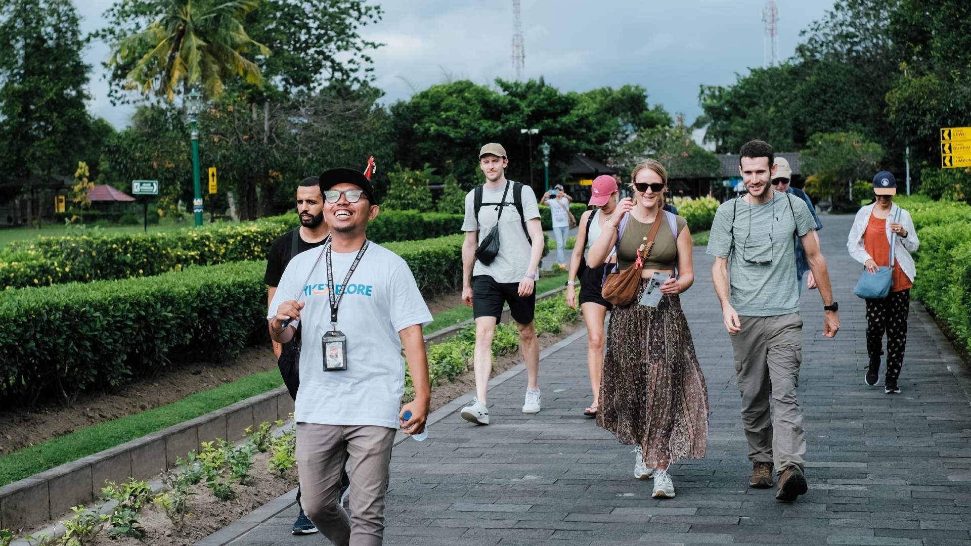 A Tour leader with some  foreigner in borobudur 